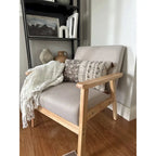Fauteuil de salon en bois avec assise rembourrée